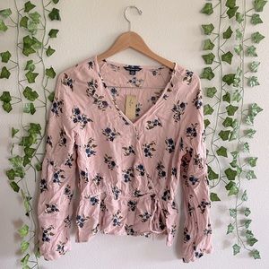 American eagle pink floral pendulum blouse. Size medium.